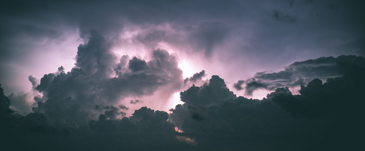 A large cloud filled with lots of dark clouds.