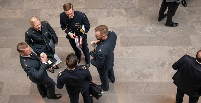 Officers in the entrance hall.